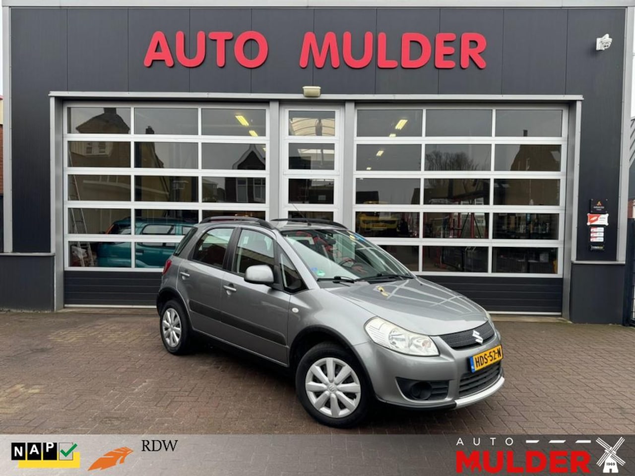 Suzuki SX4 - 1.6 4GRIP EXCLUSIVE / 4X4 . TREKHAAK / 1e EIGENAAR / RIJKLAAR! - AutoWereld.nl