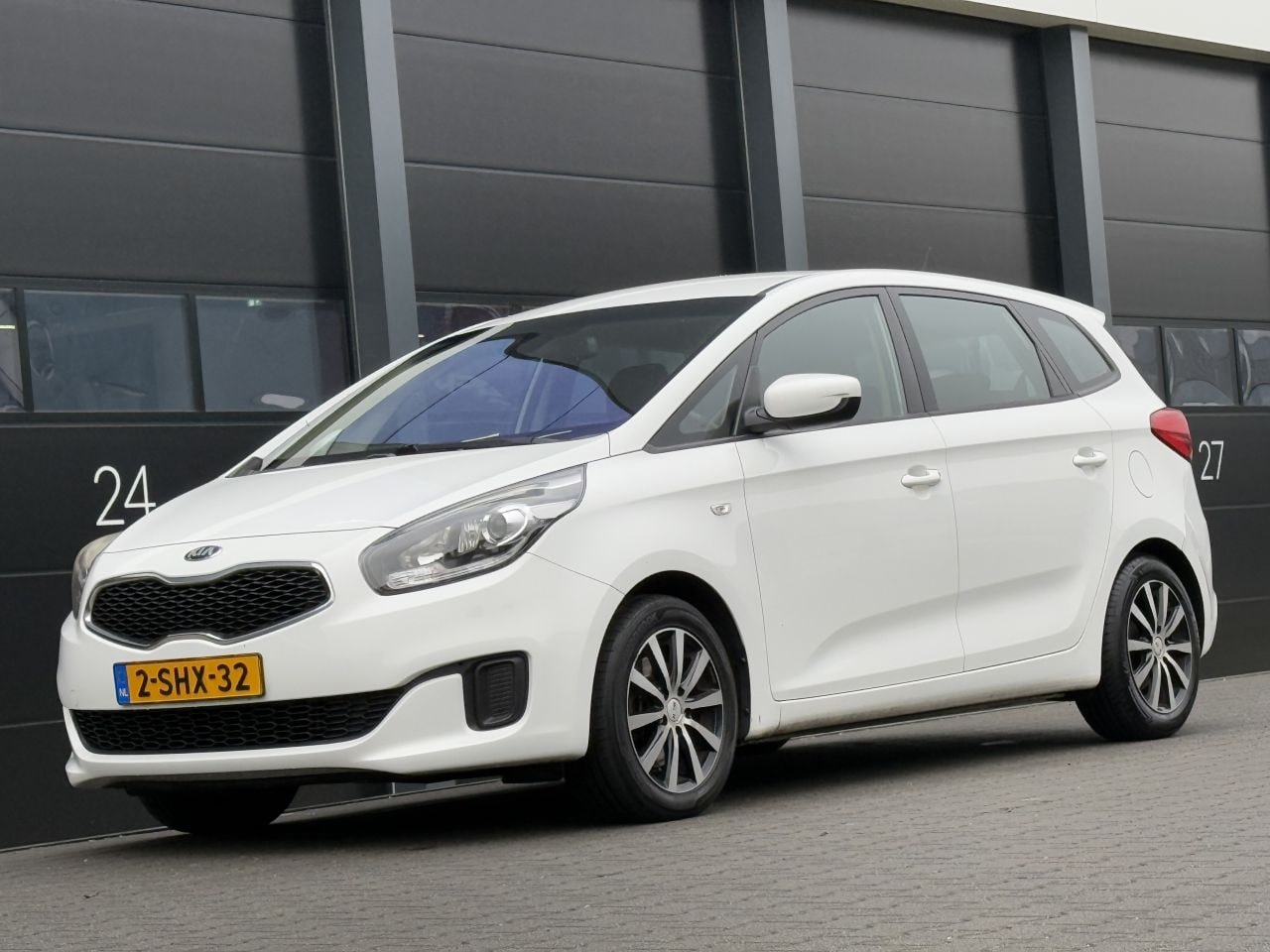 Kia Carens - 1.7 CRDi Navi Clima 7-PERS - AutoWereld.nl