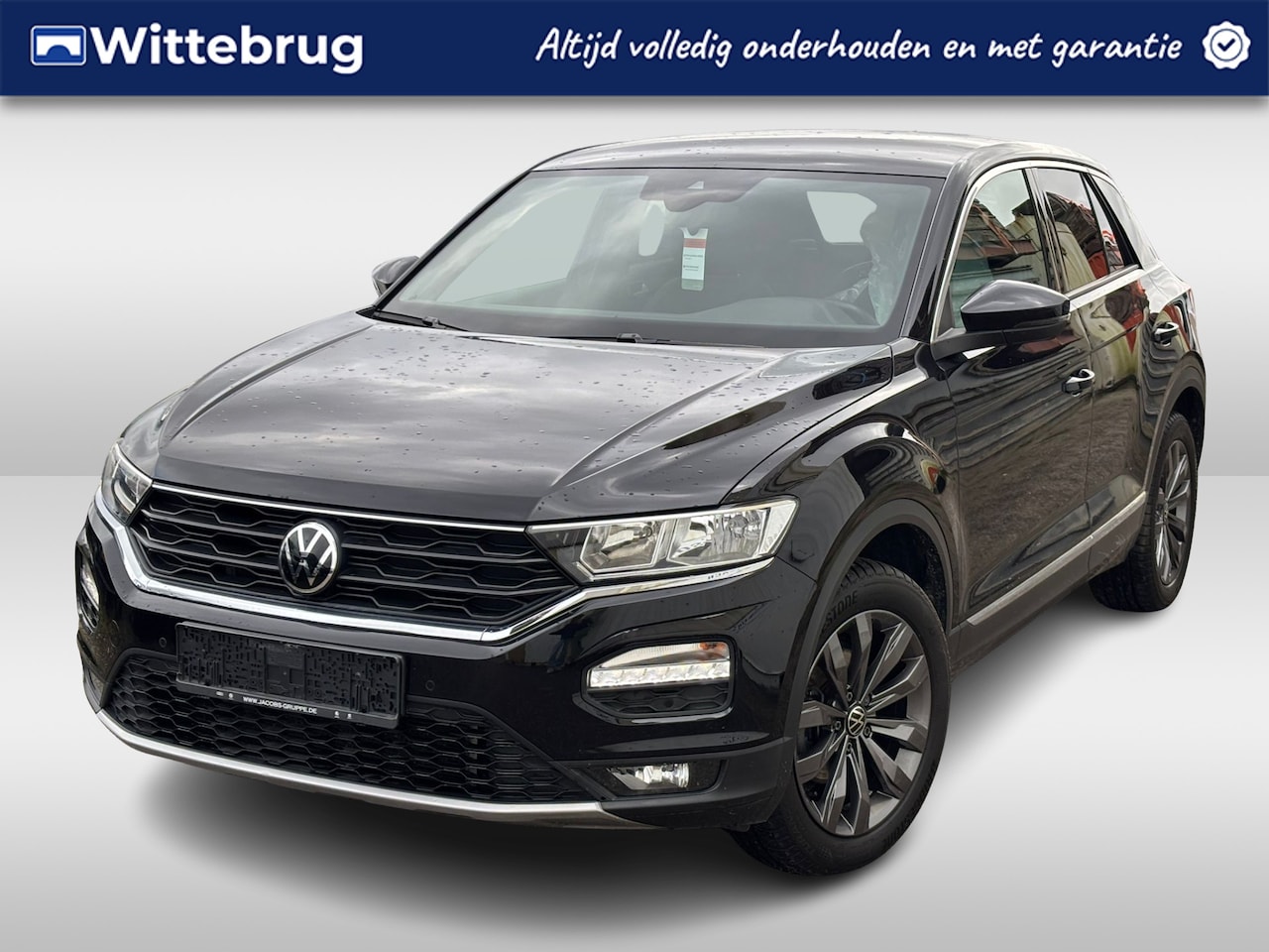 Volkswagen T-Roc - 1.5 TSI Sport / 17"LMV / NAVI - AutoWereld.nl