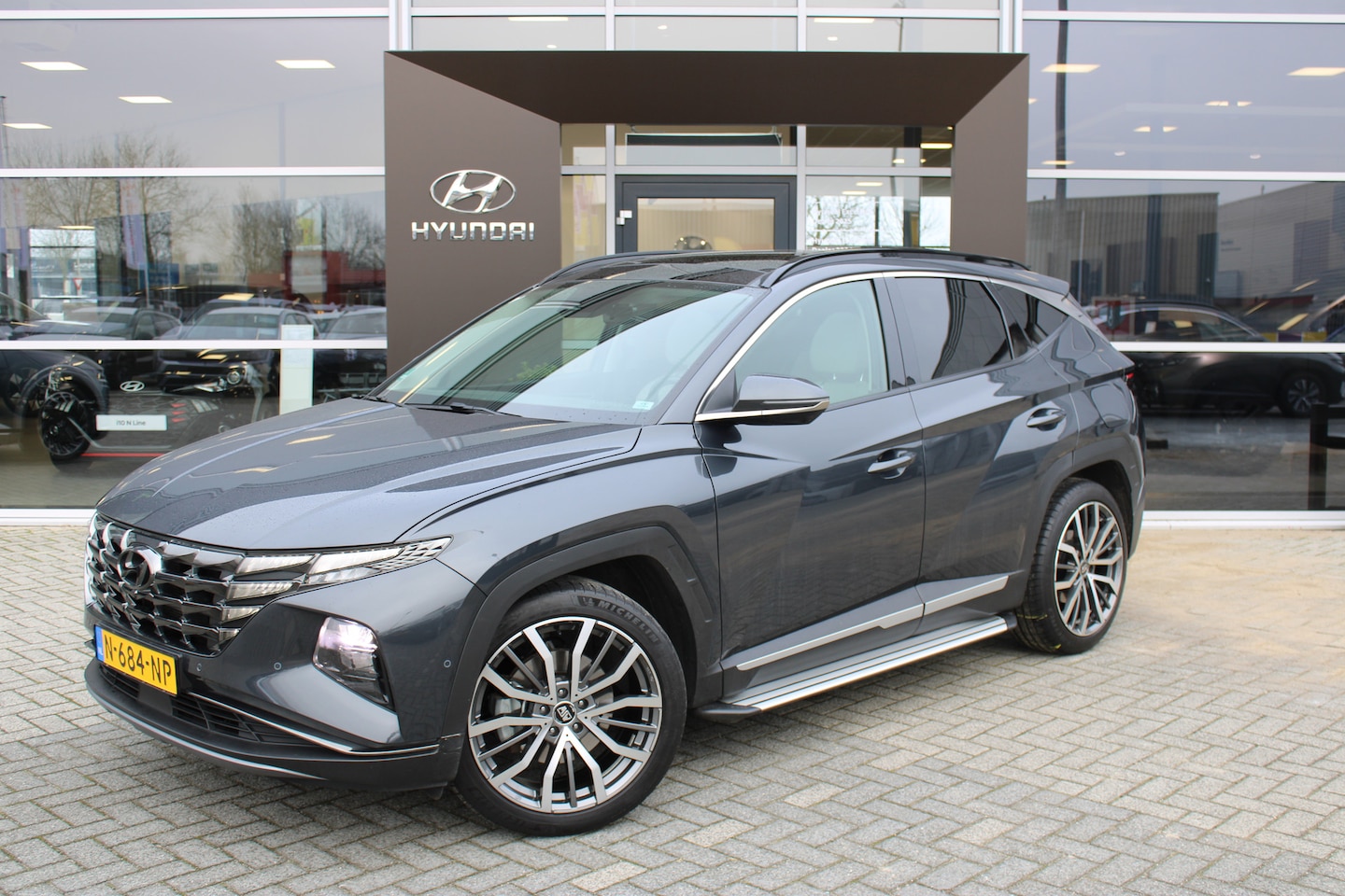 Hyundai Tucson - 1.6 T-GDI HEV Premium Sky | Apple Carplay/Android Auto|telefoonintegratie premium | LED ac - AutoWereld.nl