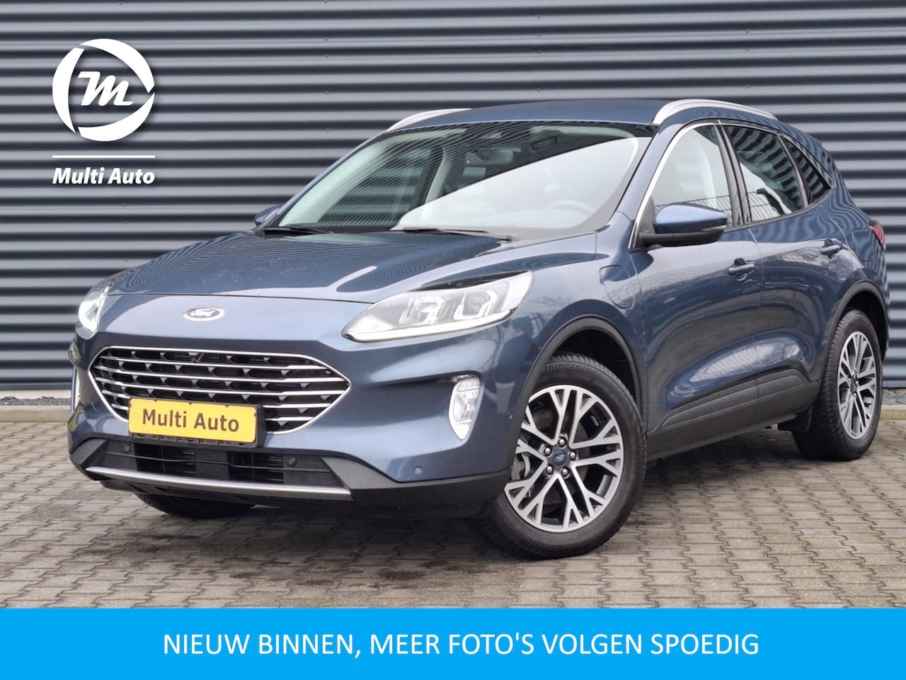 Ford Kuga - 2.5 Titanium Plug in Hybrid 225pk Dealer O.H. PHEV | Navigatie | Adaptive Cruise | Apple C - AutoWereld.nl