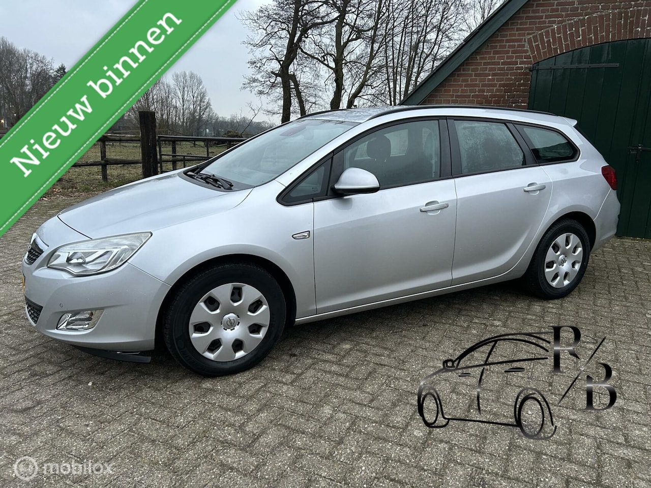 Opel Astra Sports Tourer - 1.7 CDTi Cosmo APK/ - AutoWereld.nl