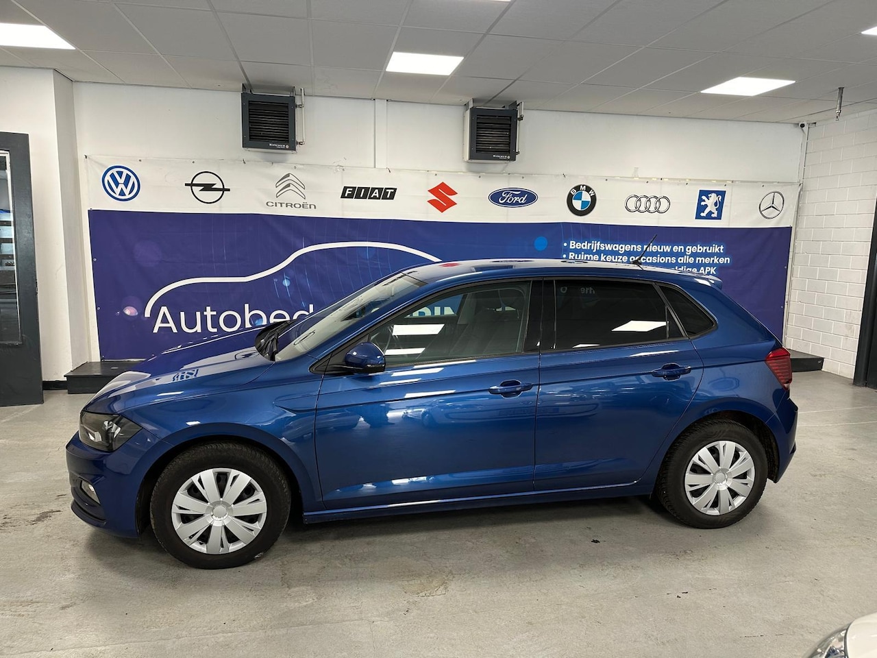 Volkswagen Polo - 1.0 TSI Comfortline/NAVI/ CARPLAY/CRUIS - AutoWereld.nl