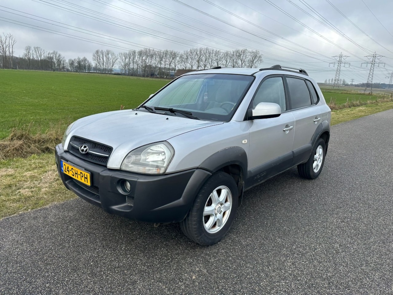 Hyundai Tucson - 2.0i Dynamic 2.0i Dynamic - AutoWereld.nl