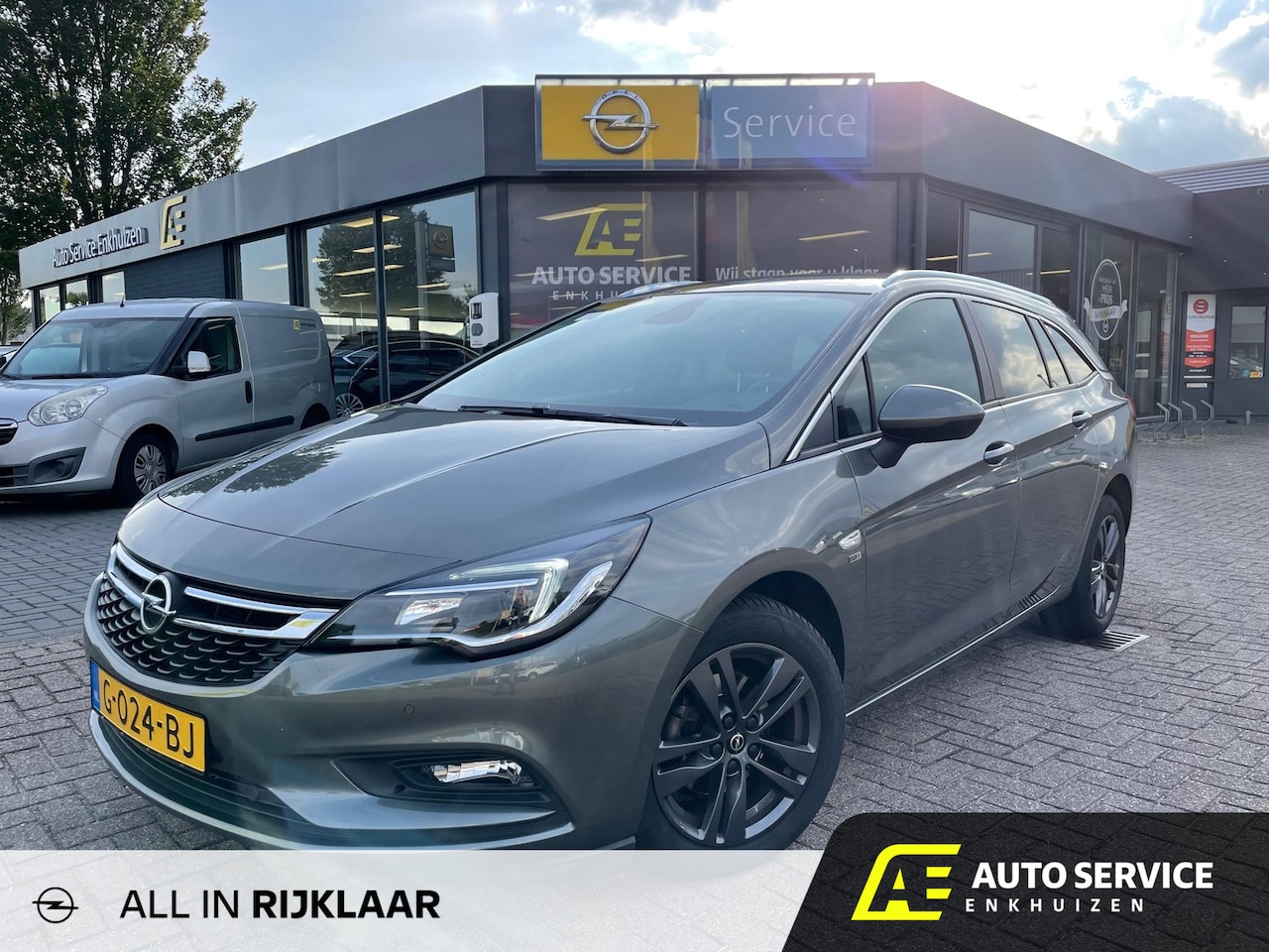 Opel Astra Sports Tourer - 1.4 Turbo 120 Jaar Edition AUTOMAAT | Clima | PDC | Carplay | LMV | NL auto | 150pk! - AutoWereld.nl