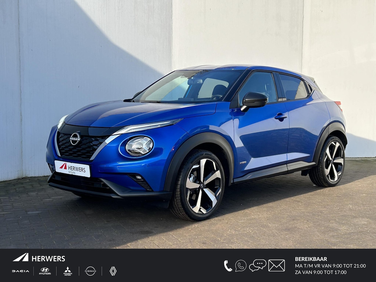 Nissan Juke - 1.6 Hybrid Tekna Automaat / Navigatie / Cruise Control Adaptief / Rondomzicht Camera / Bos - AutoWereld.nl