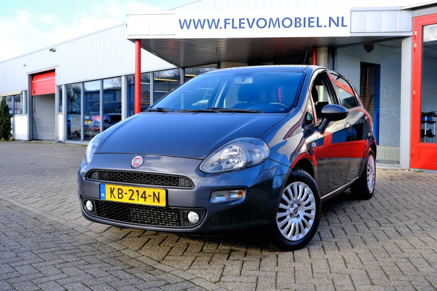 Fiat Punto Evo - 0.9 TwinAir Lounge 5-drs Airco|LMV - AutoWereld.nl