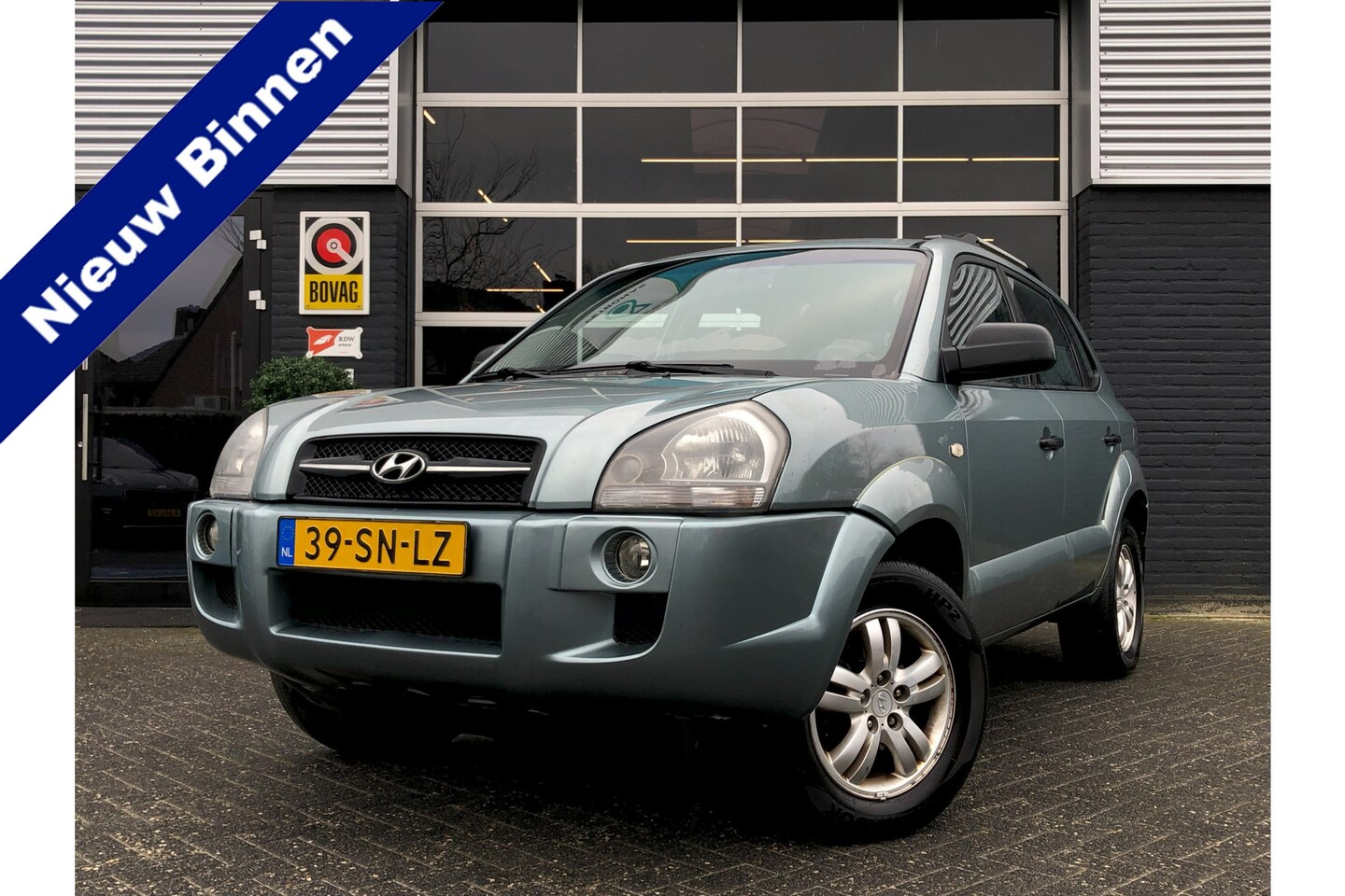 Hyundai Tucson - 2.0i Active 2.0i Active, Airco, Radio, Trekhaak, NAP - AutoWereld.nl