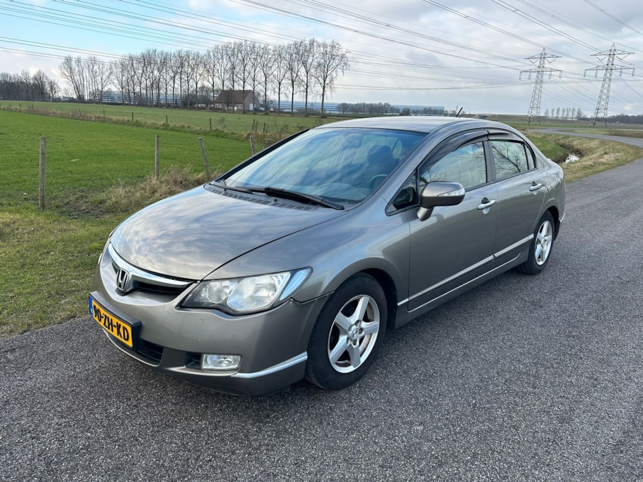 Honda Civic - 1.3 Hybrid AIRCO ! - AutoWereld.nl