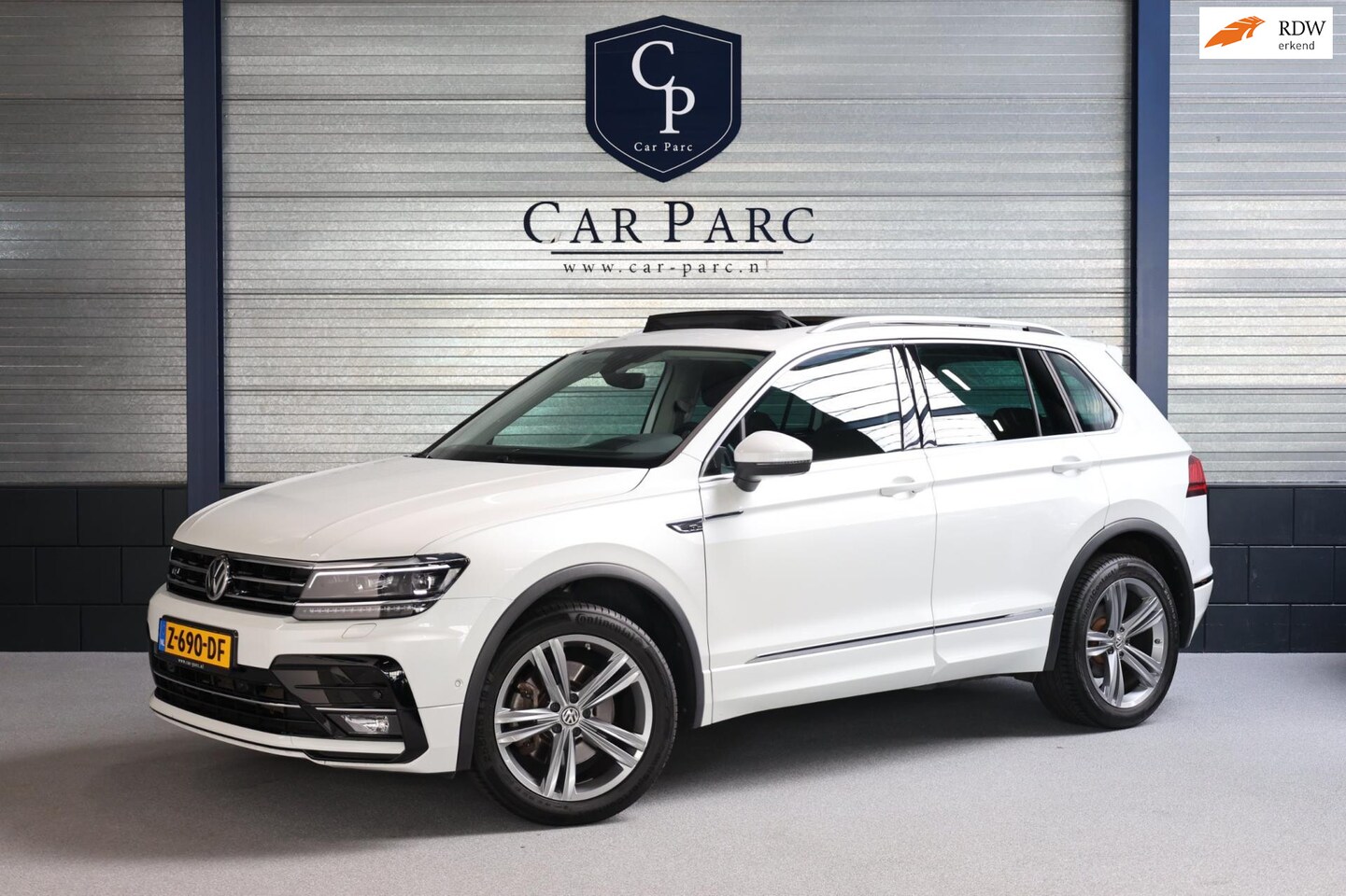 Volkswagen Tiguan - 2.0 TSI 4Motion Sound R-line 180+PK LED/VIRTUAL/S.VERWARMING/LMV/360 CAM/ACC/ECC/12 MND GA - AutoWereld.nl