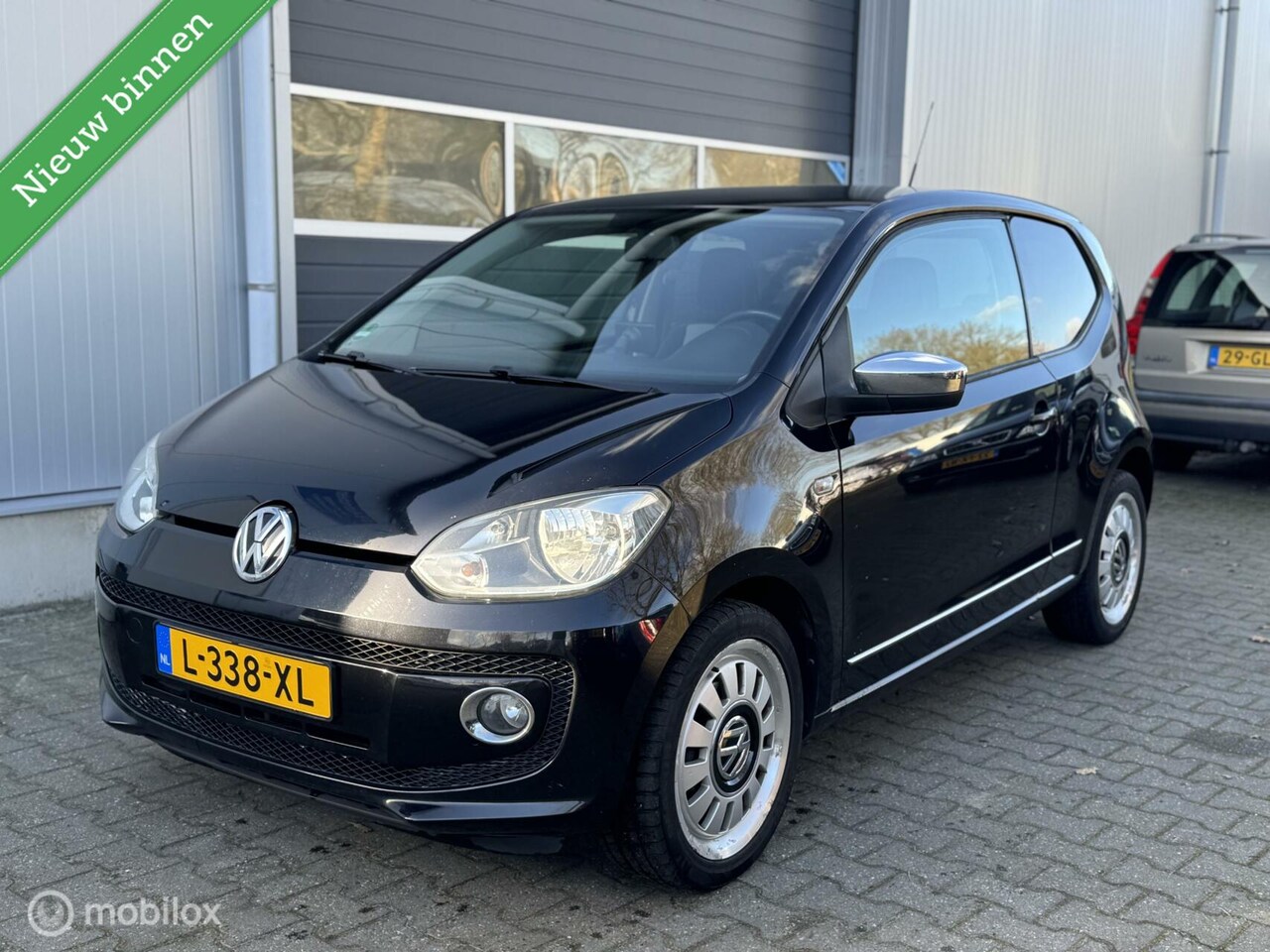 Volkswagen Up! - 1.0 high up! 1.0 high up!, Navi, Airco - AutoWereld.nl