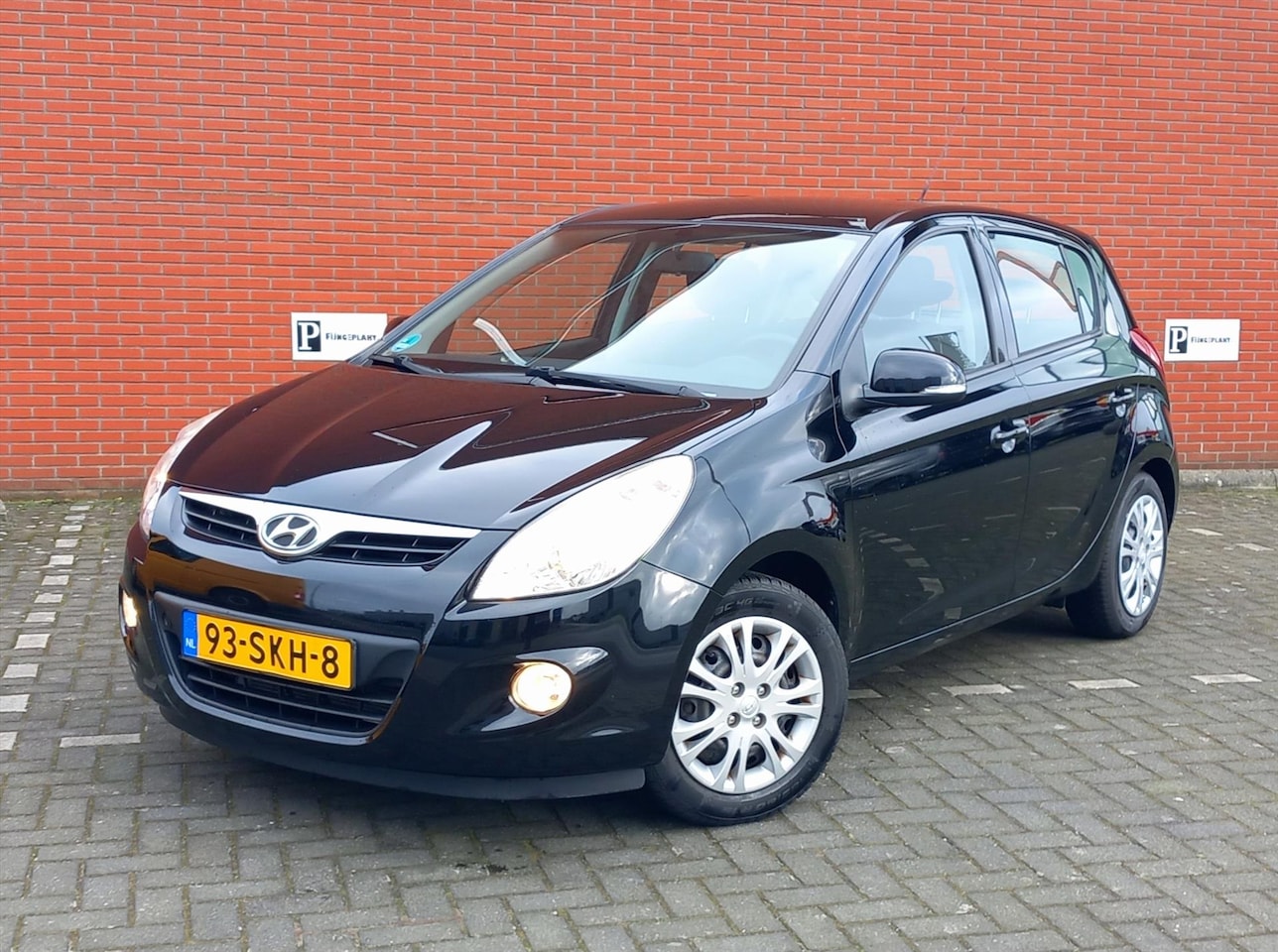 Hyundai i20 - 1.2i 78pk 5D i-Motion Airco Trekhaak - AutoWereld.nl