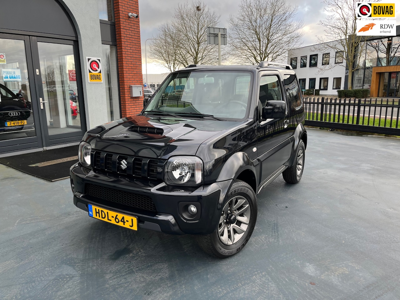 Suzuki Jimny - 1.3 Rhino 4X4 LEER STOELVERWARMING - AutoWereld.nl