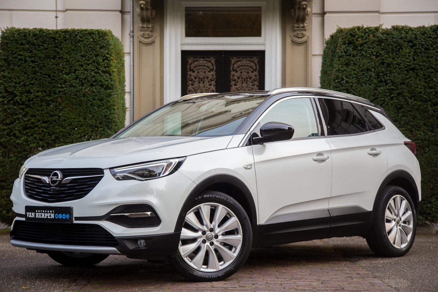 Opel Grandland X - 1.6 Turbo Hybrid4 Ultimate Trekhaak | Leder | 360 Cam | ACC - AutoWereld.nl