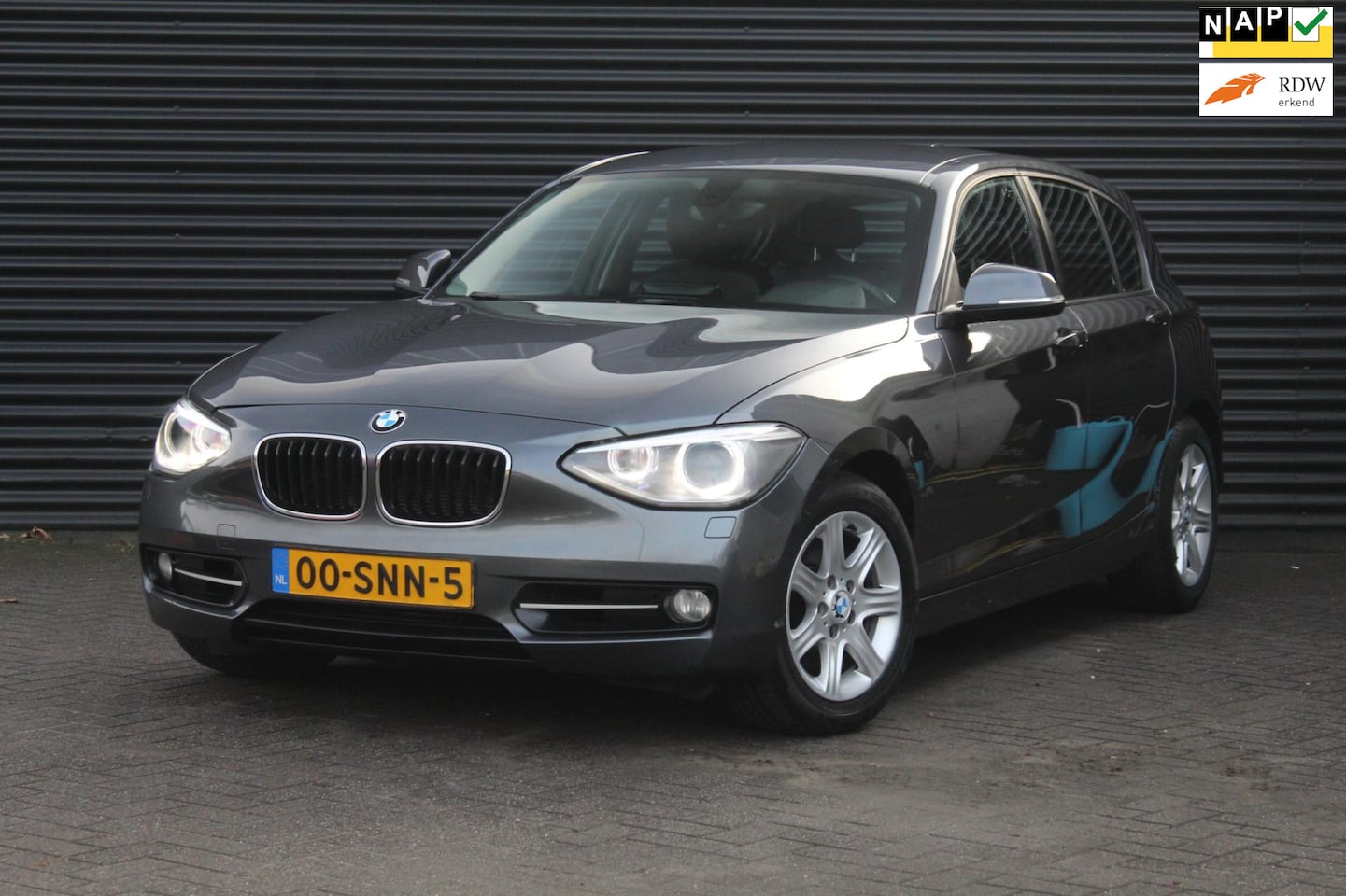 BMW 1-serie - 118i Business | Navi | Clima | Cruise | Leder | Xenon | - AutoWereld.nl