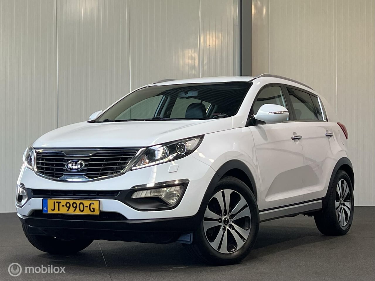 Kia Sportage - 1.7 CRDI Super Pack [ volledige historie half-leder xenon ] - AutoWereld.nl