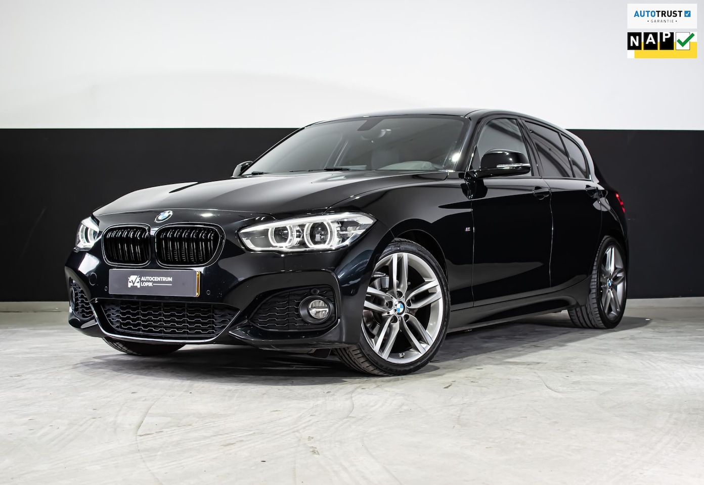 BMW 1-serie - 118i High Executive M-Sport *Elektrische stoelen* - AutoWereld.nl