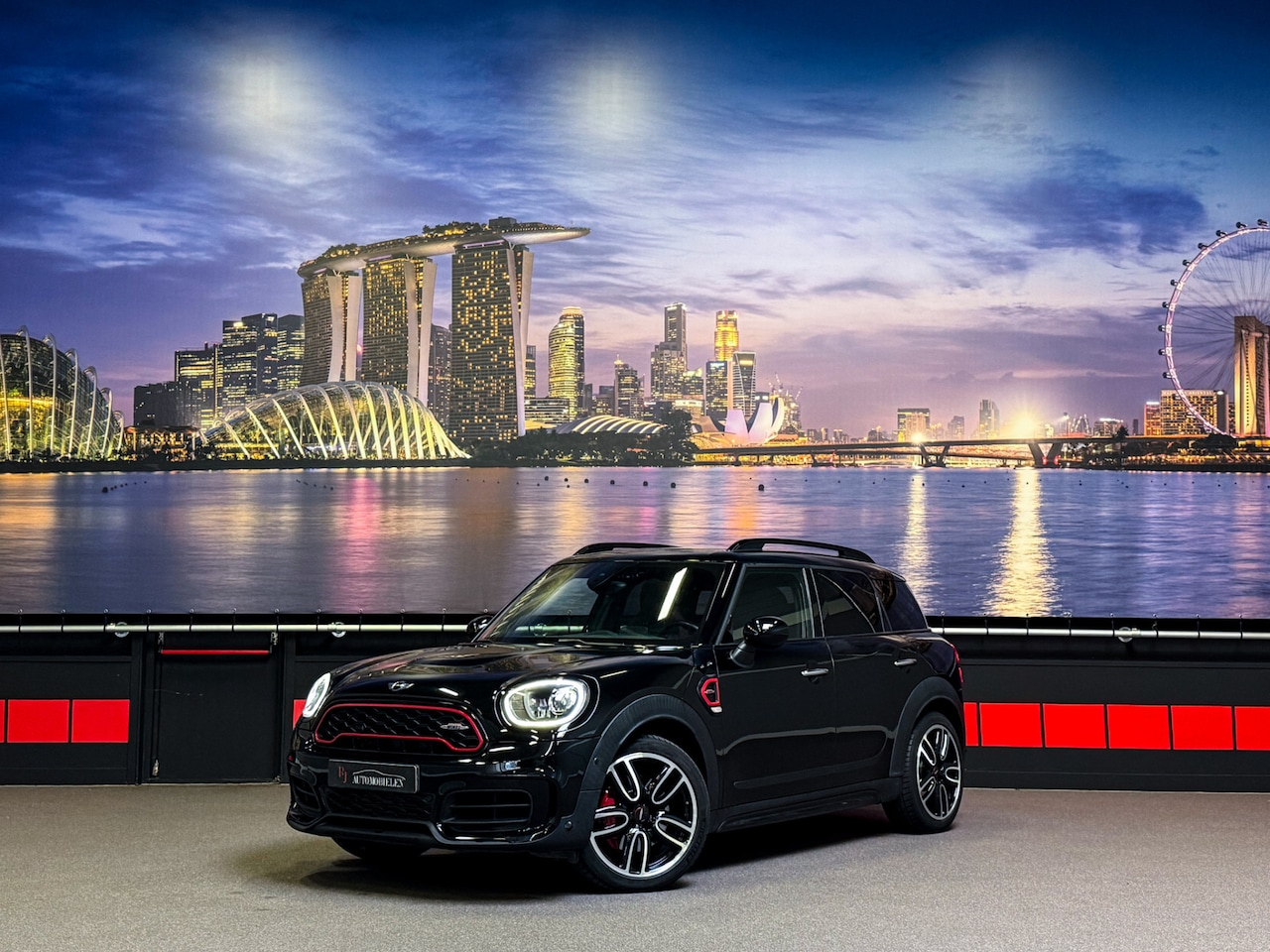 MINI Countryman - Mini 2.0 John Cooper Works ALL4 Chili |H/K|HUD|Pano|Camera - AutoWereld.nl