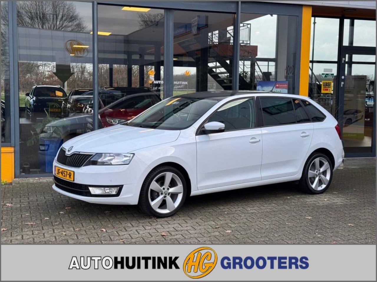 Skoda Rapid - 1.2 TSI Greentech Joy - stoelverwarming - climate control - navi - AutoWereld.nl