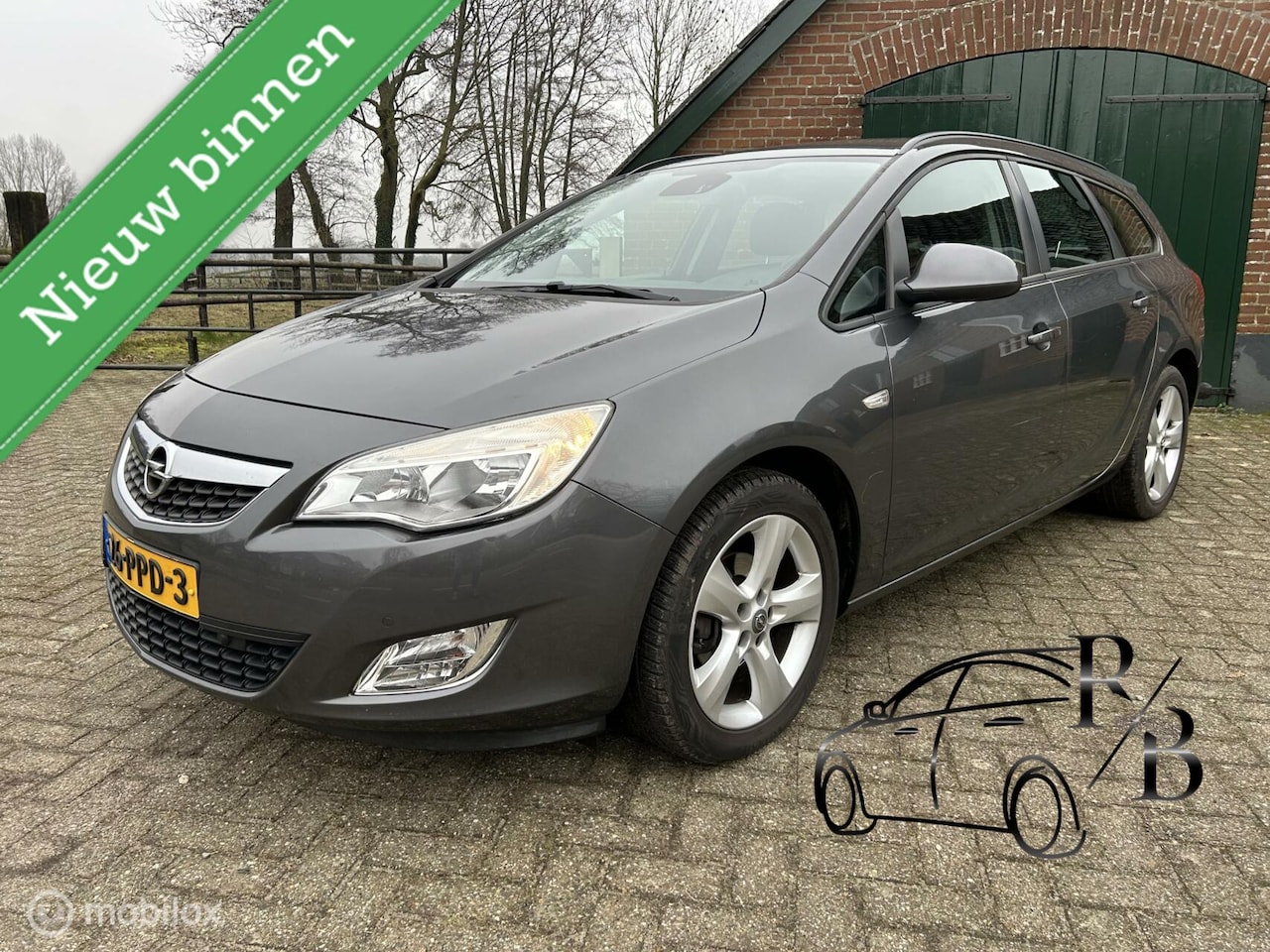 Opel Astra - 1.4 Turbo Edition NAVI/AIRCO/CRUISE/TREKHAAK - AutoWereld.nl