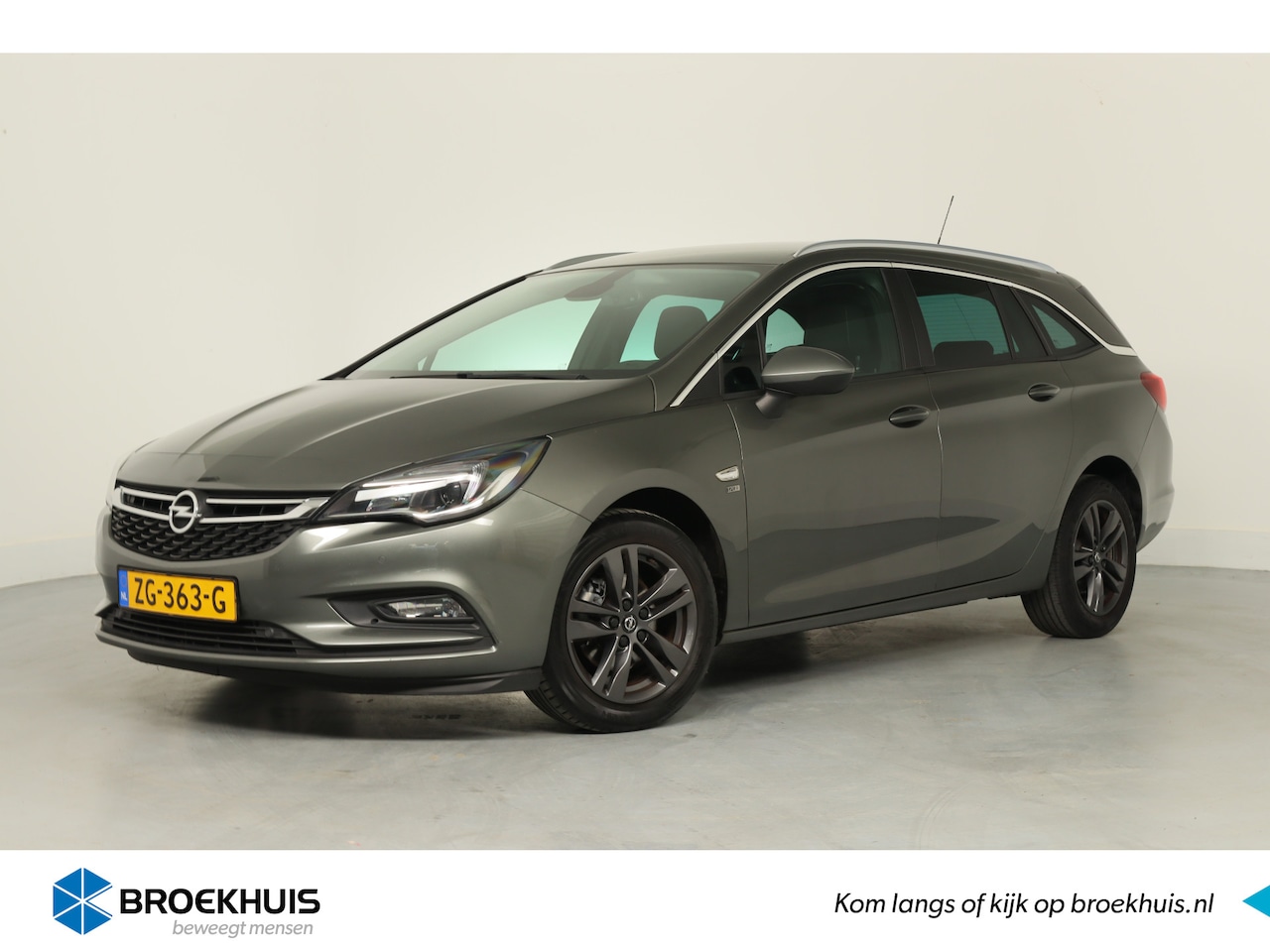 Opel Astra Sports Tourer - 1.0 Turbo 120 Jaar Edition | Dealer Onderhouden! | Navi | Clima | Parkeersensoren | Cruise - AutoWereld.nl