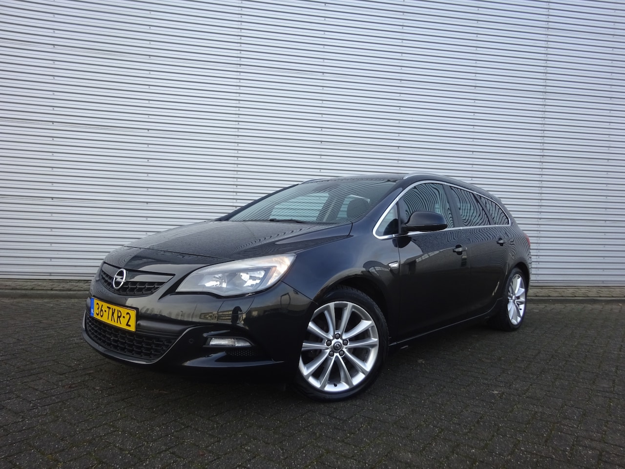 Opel Astra Sports Tourer - 1.4 Turbo Sport Airco / Navi / Cruise / Trekhaak / NAP - AutoWereld.nl