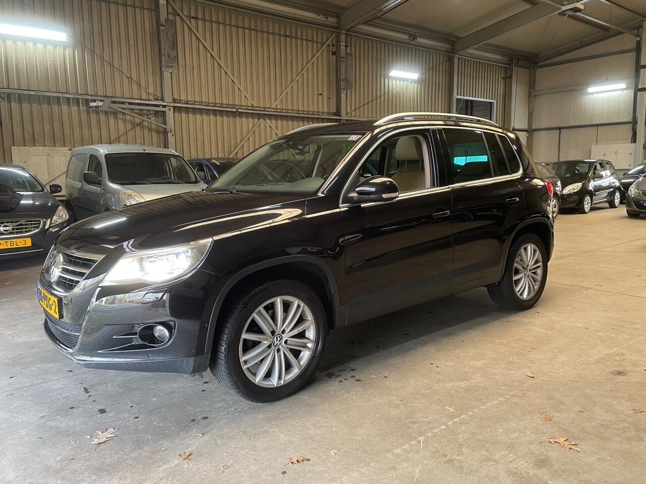 Volkswagen Tiguan - 2.0 TSI Sport&Style 4Motion |nette auto|Automaat|Panorama| - AutoWereld.nl