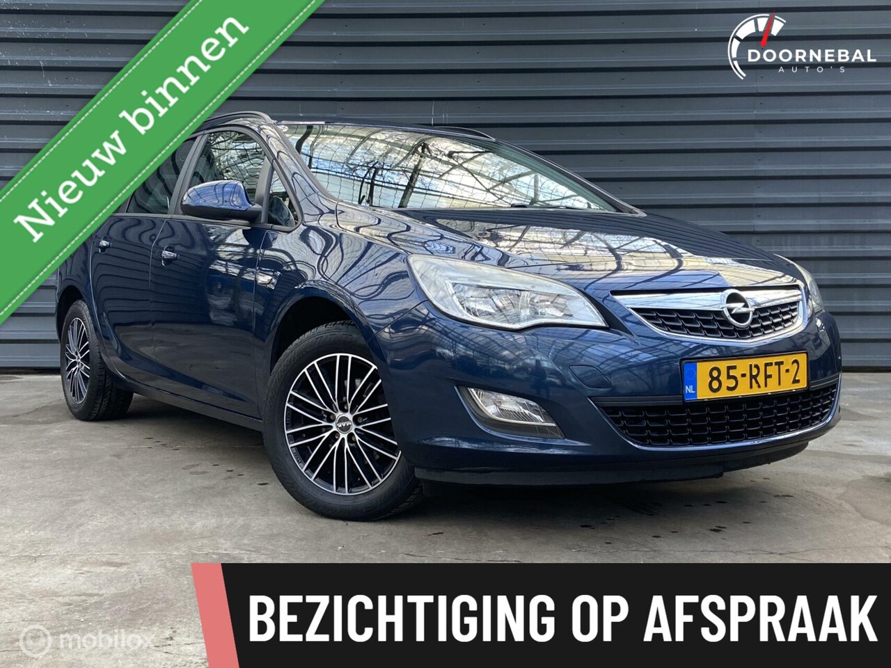 Opel Astra Sports Tourer - 1.4 Edition / TREKHAAK / AIRCO ! - AutoWereld.nl