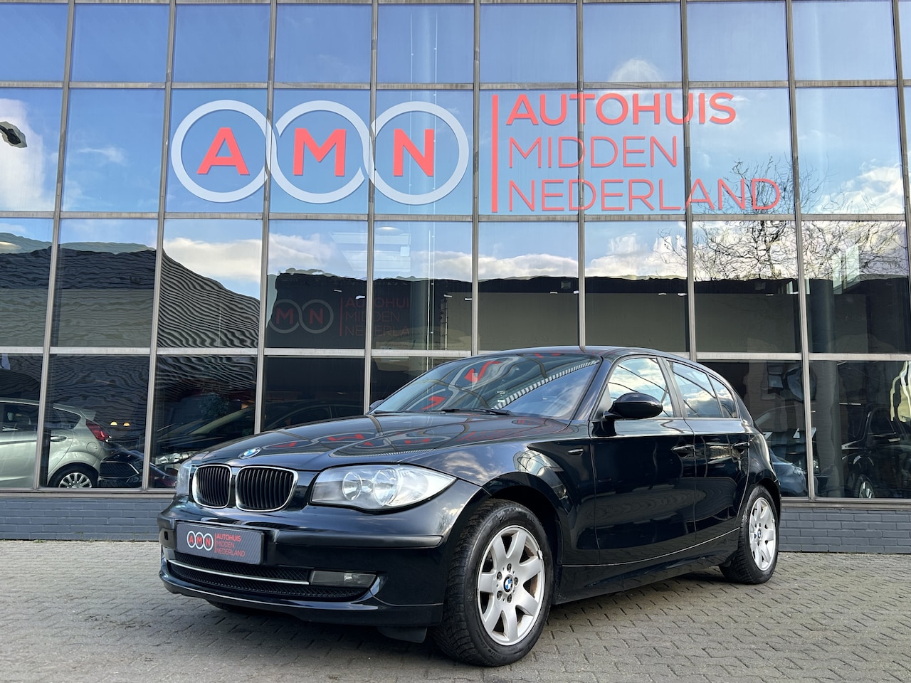 BMW 1-serie - 116i Business Line 2.0L Start/Stopsysteem,Elekpakket,Airco,LMV17” - AutoWereld.nl