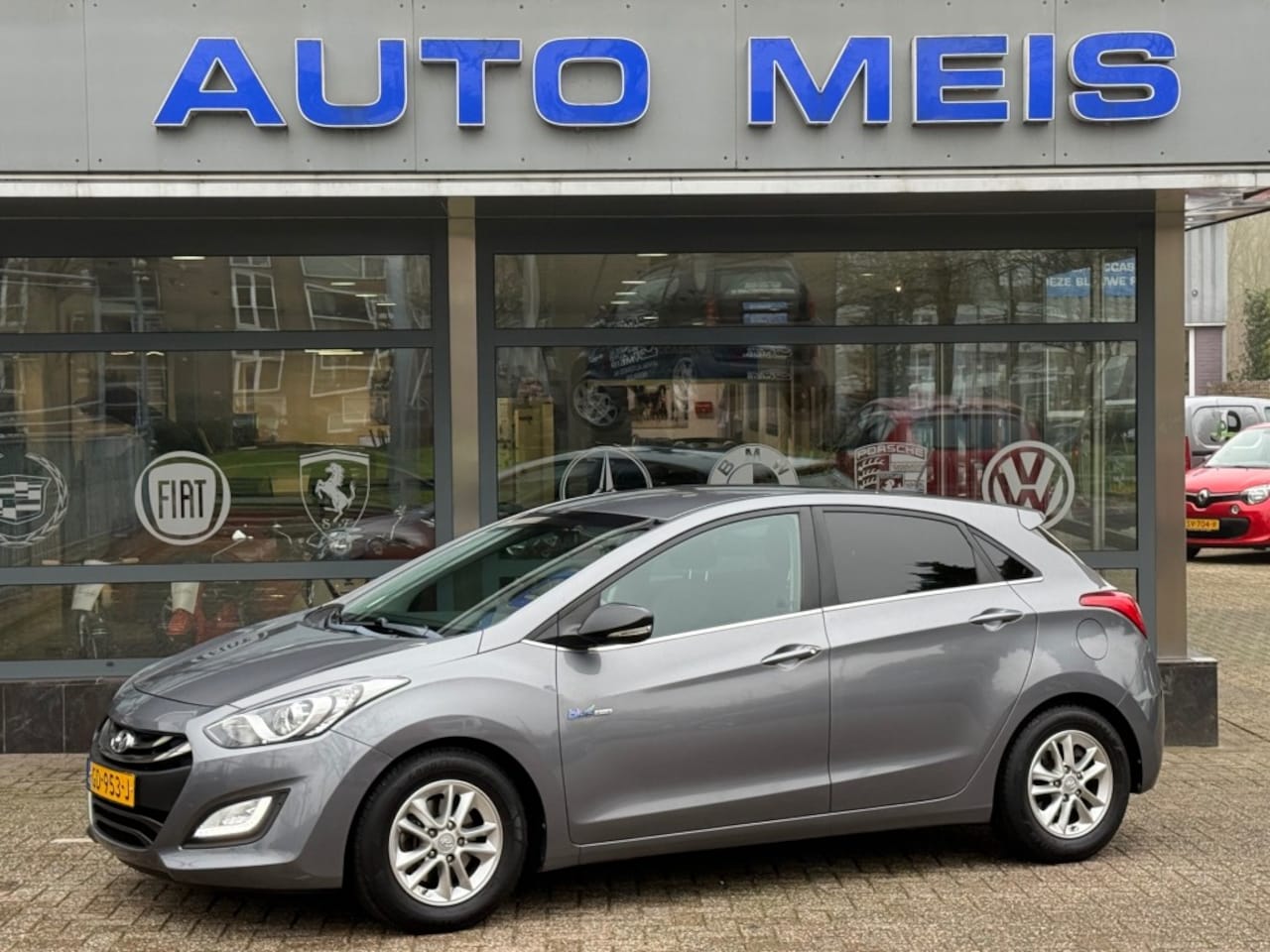 Hyundai i30 - 1.6 GDI GO! Navi Camera Clima Cruise PDC - AutoWereld.nl