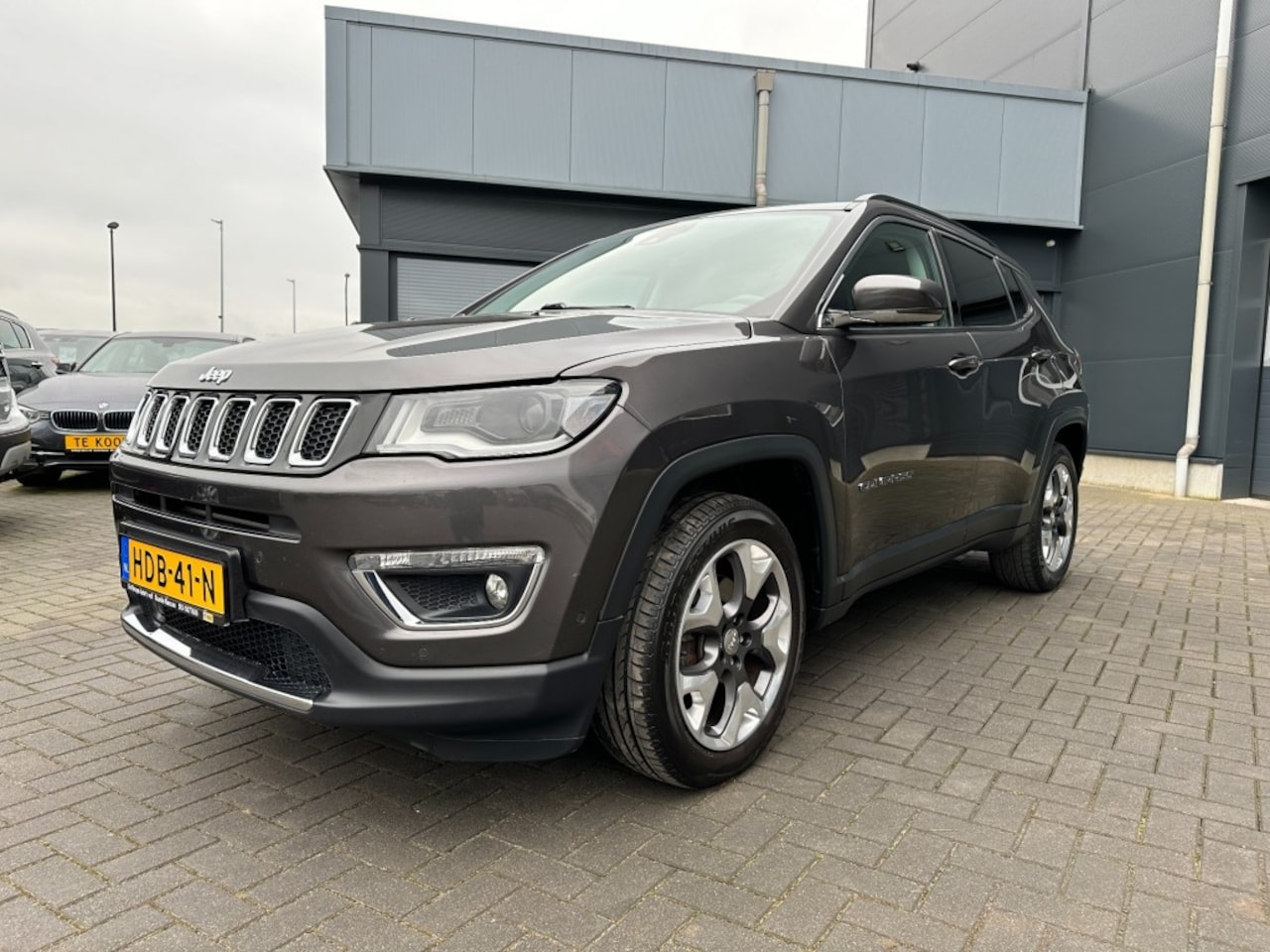 Jeep Compass - 1.4 MultiAir Limited Navigatie achteruitrijcamera Leder - AutoWereld.nl