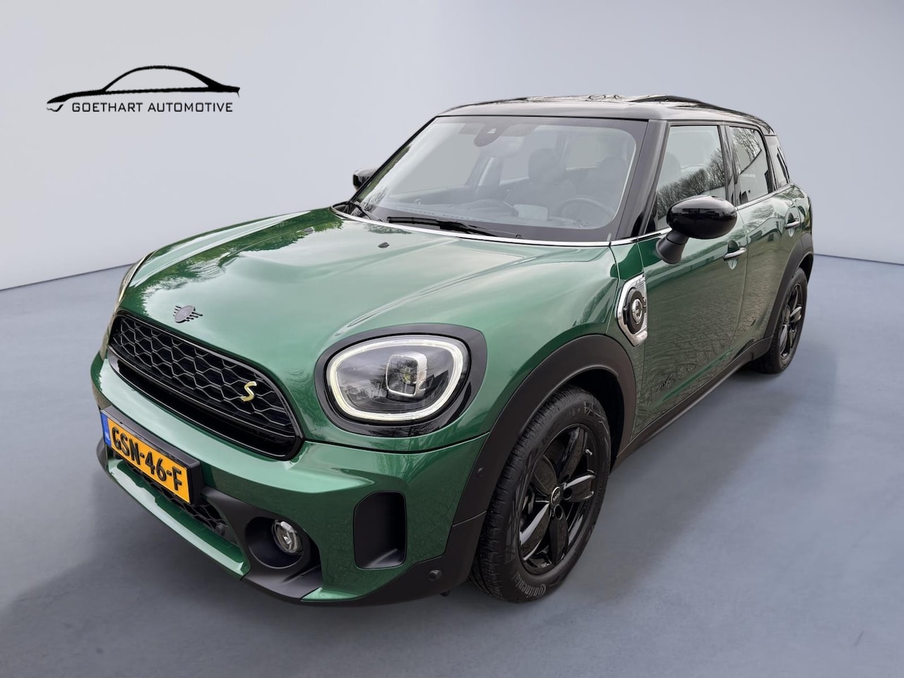 MINI Countryman - Cooper S E ALL4 Premium Plus / Pano / H-K / Head up / Elek. A-klep / Camera - AutoWereld.nl