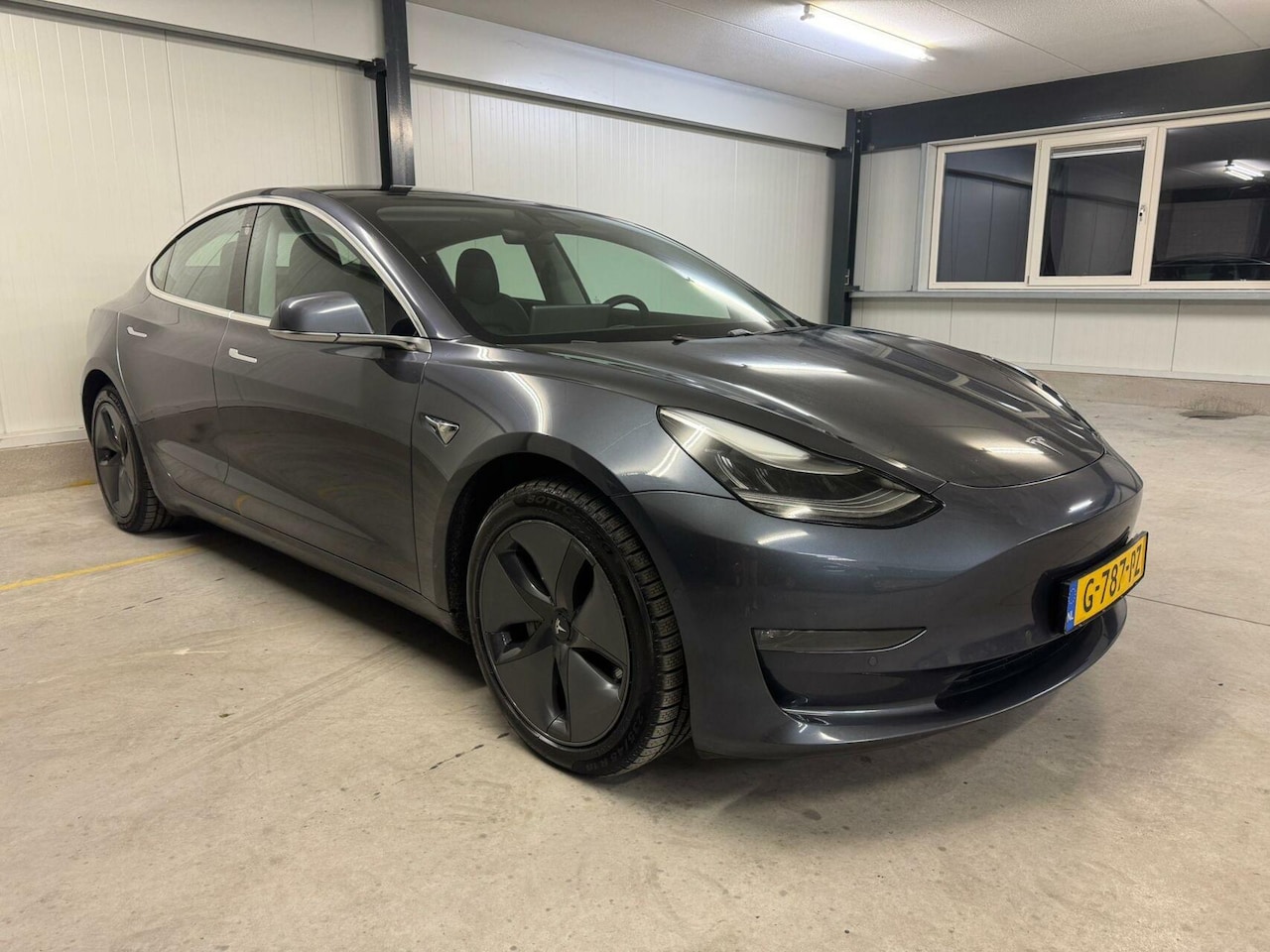 Tesla Model 3 - Long Range RWD Long Range AWD 75 kWh - AutoWereld.nl