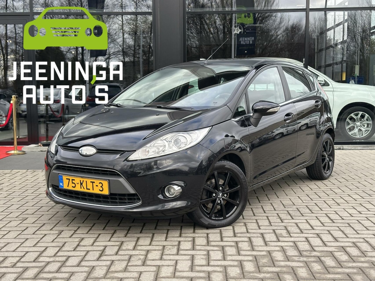 Ford Fiesta - 1.6 TDCi Titanium | Leer | Clima | Cruise - AutoWereld.nl