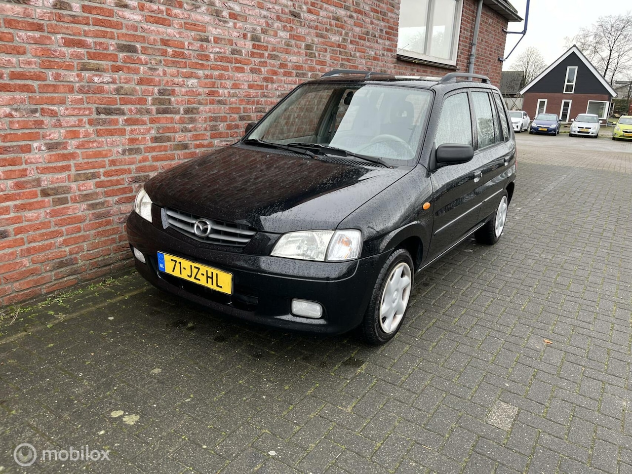 Mazda Demio - 1.5 Touring 1.5 Touring - AutoWereld.nl