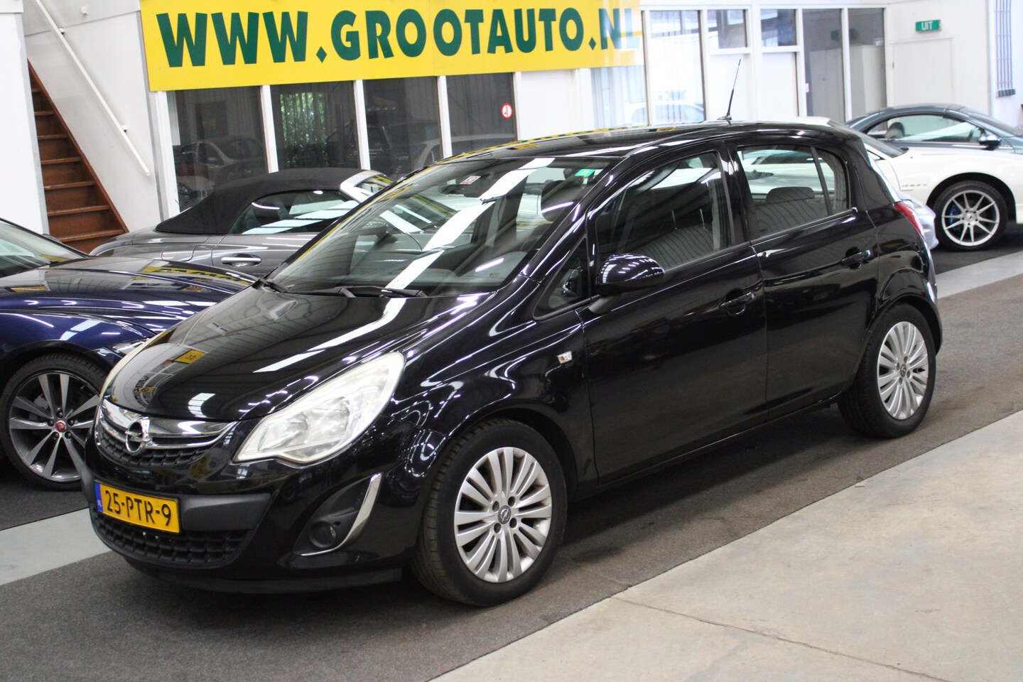 Opel Corsa - 1.4-16V Edition Airco, Navi, Trekhaak, Stuurbekrachtiging - AutoWereld.nl