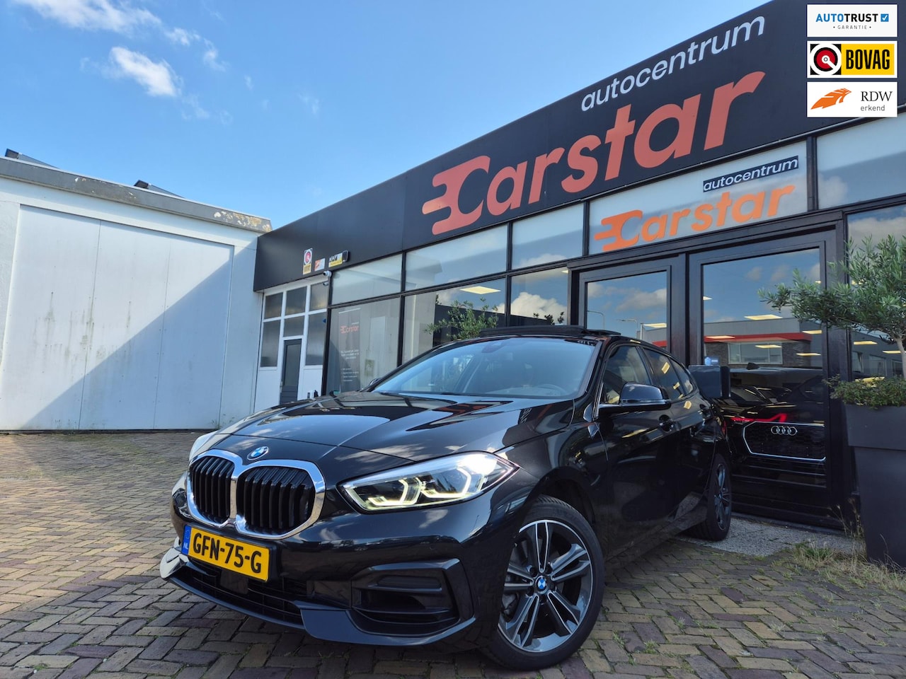 BMW 1-serie - 116i High Executive|Pano|Leer|Car-Play|Camera - AutoWereld.nl