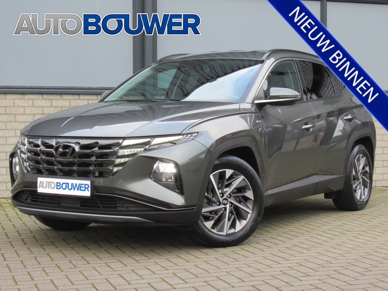 Hyundai Tucson - 1.6 T-GDI MHEV Comfort Smart 2e eigen | dealer onderh | navi | camera | cruise - AutoWereld.nl