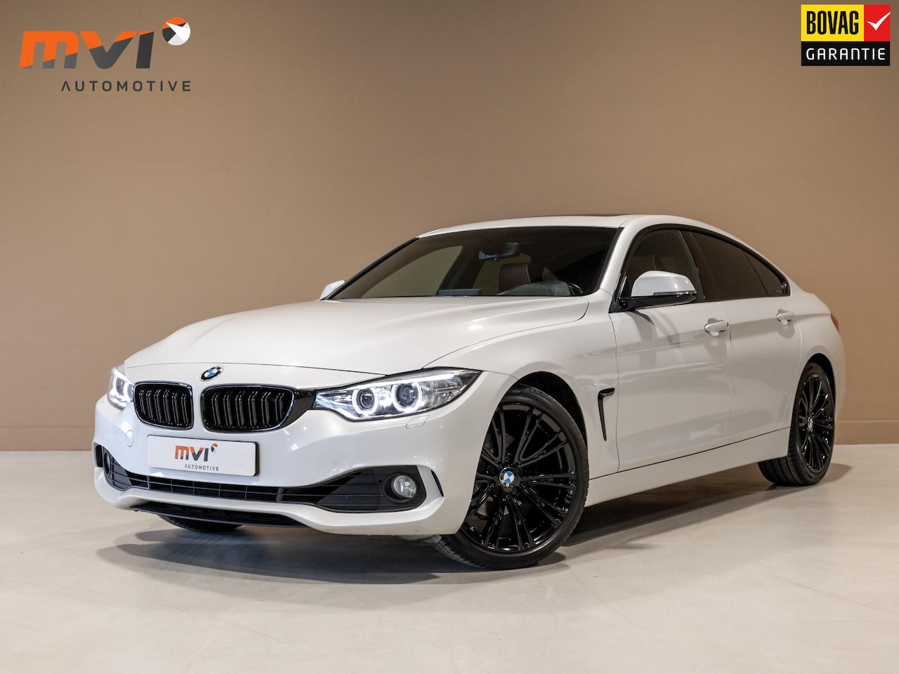 BMW 4-serie Gran Coupé - 420i Centennial High Executive / Individual leder / Schuifdak / Sportstoelen / - AutoWereld.nl