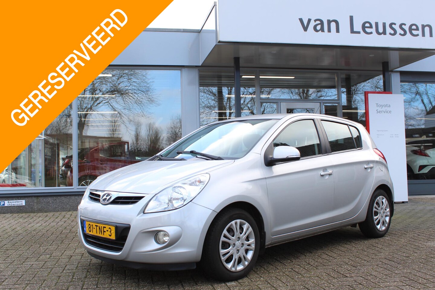 Hyundai i20 - 1.2I MOTION TREKHAAK PARK.SENSOREN AIRCO EL-RAMEN & SPIEGELS - AutoWereld.nl