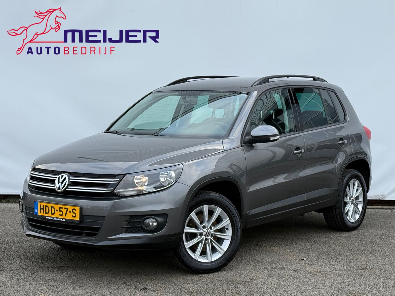 Volkswagen Tiguan - 1.4 TSI Comfort&Design Sportvelgen | Dakrails | Airco | Stoelverwarming !! - AutoWereld.nl