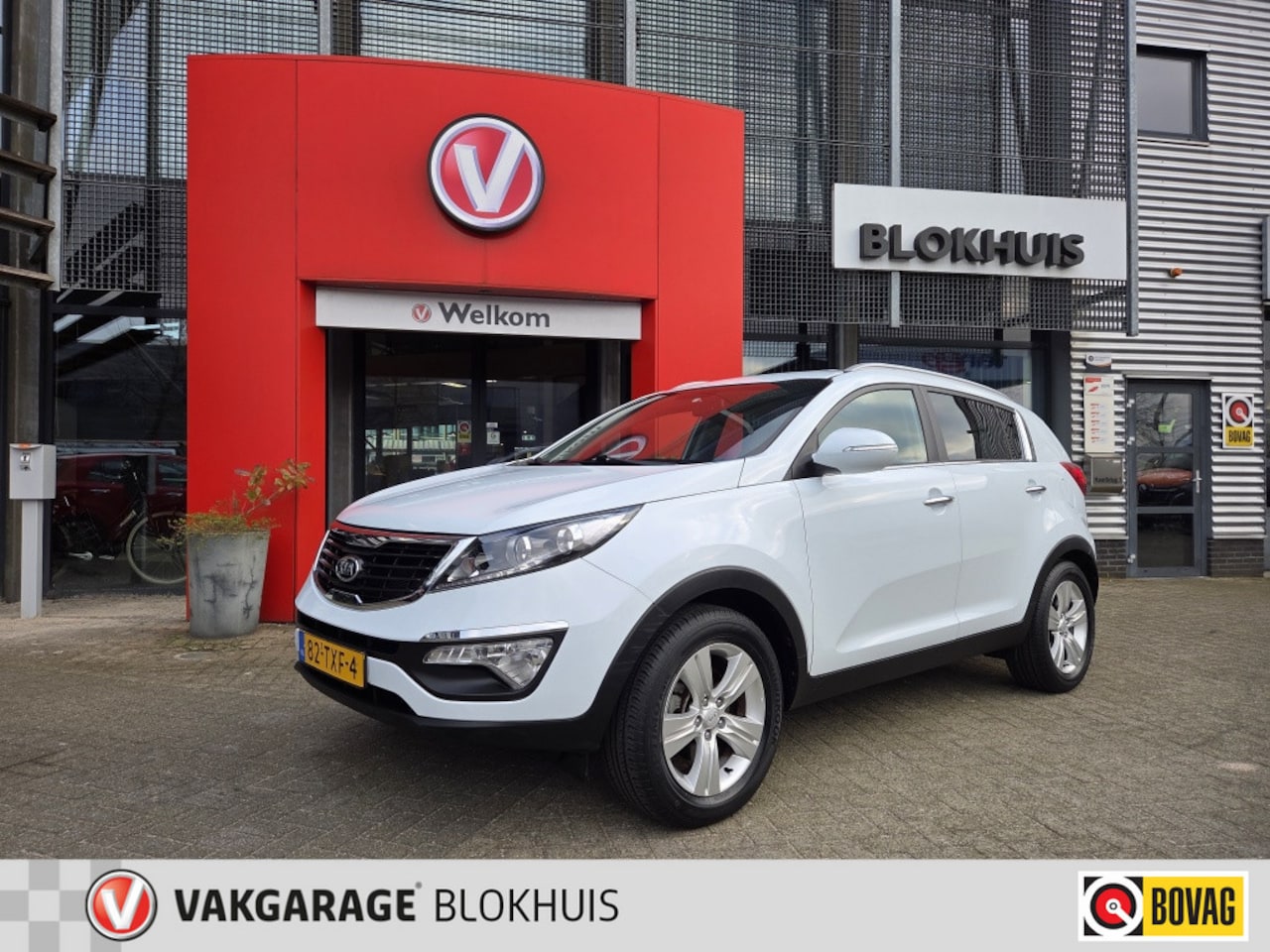 Kia Sportage - 2.0 X-ecutive Plus | Climate | Cruise | Trekhaak - AutoWereld.nl