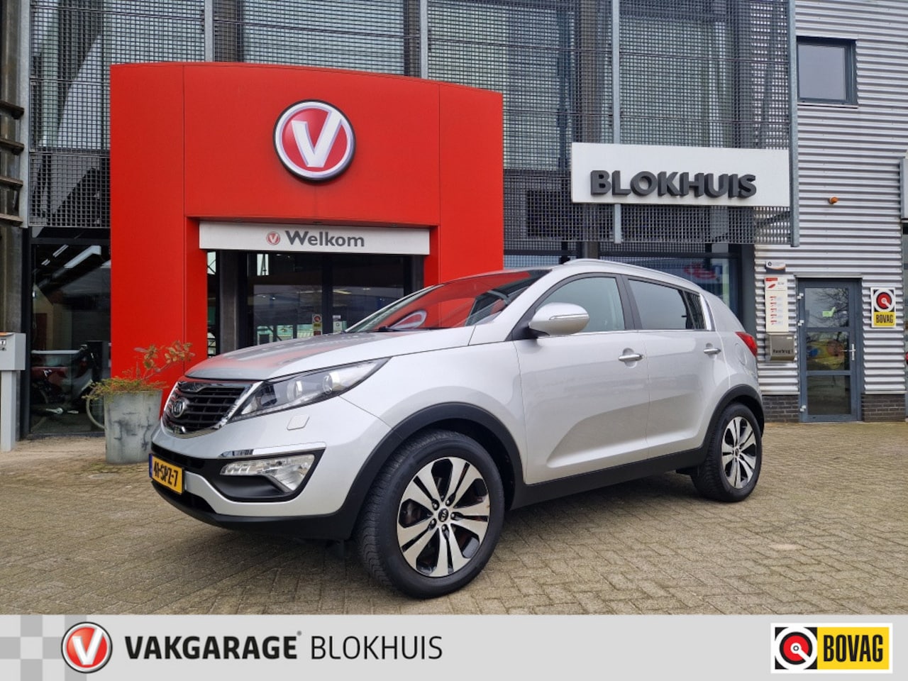 Kia Sportage - 2.0 X-clusive | Navi | Leer | Camera | 1900kg trekgewicht - AutoWereld.nl