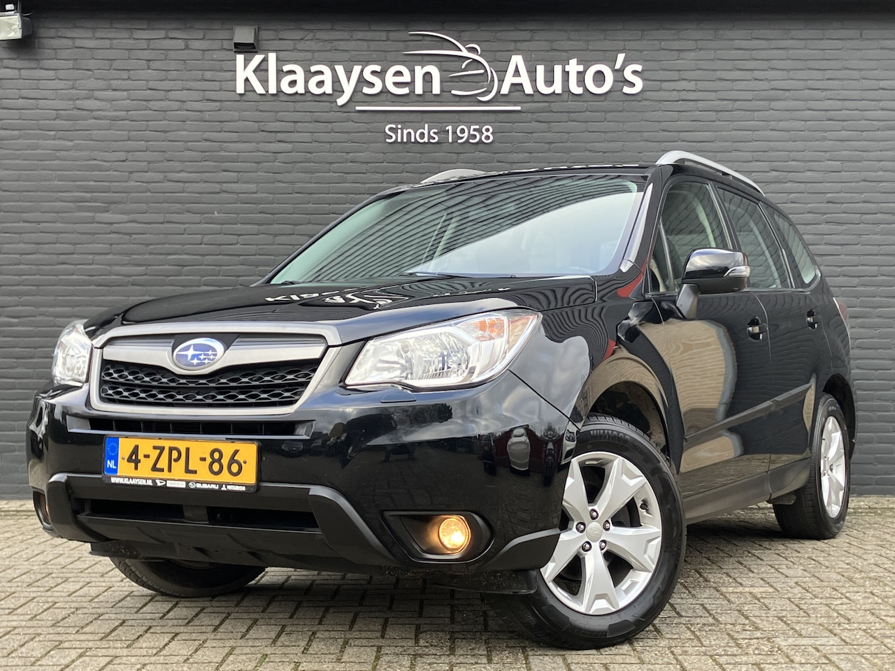 Subaru Forester - 2.0 AWD Luxury AUT. | dealer onderhouden | navigatie | cruise control | camera | climate c - AutoWereld.nl