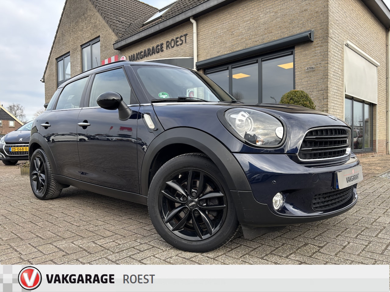 MINI Countryman - Mini 1.6 Cooper D Pepper Navigatie / Stoelverwarming / All-Seasons - AutoWereld.nl