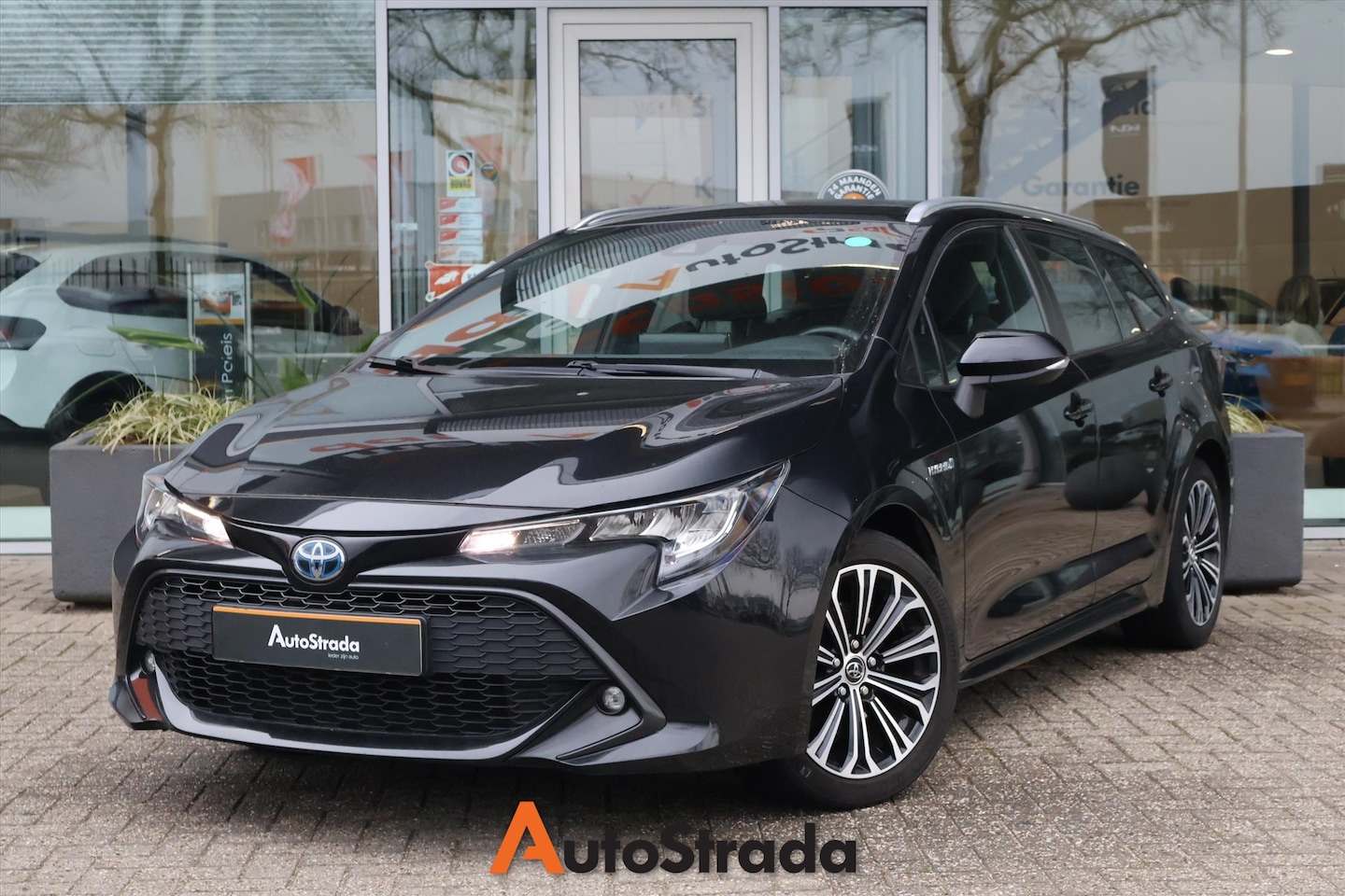 Toyota Corolla Touring Sports - 2.0 Hybrid Dynamic 184pk CVT | Carplay | Navi | LED | Camera | trekhaak - AutoWereld.nl