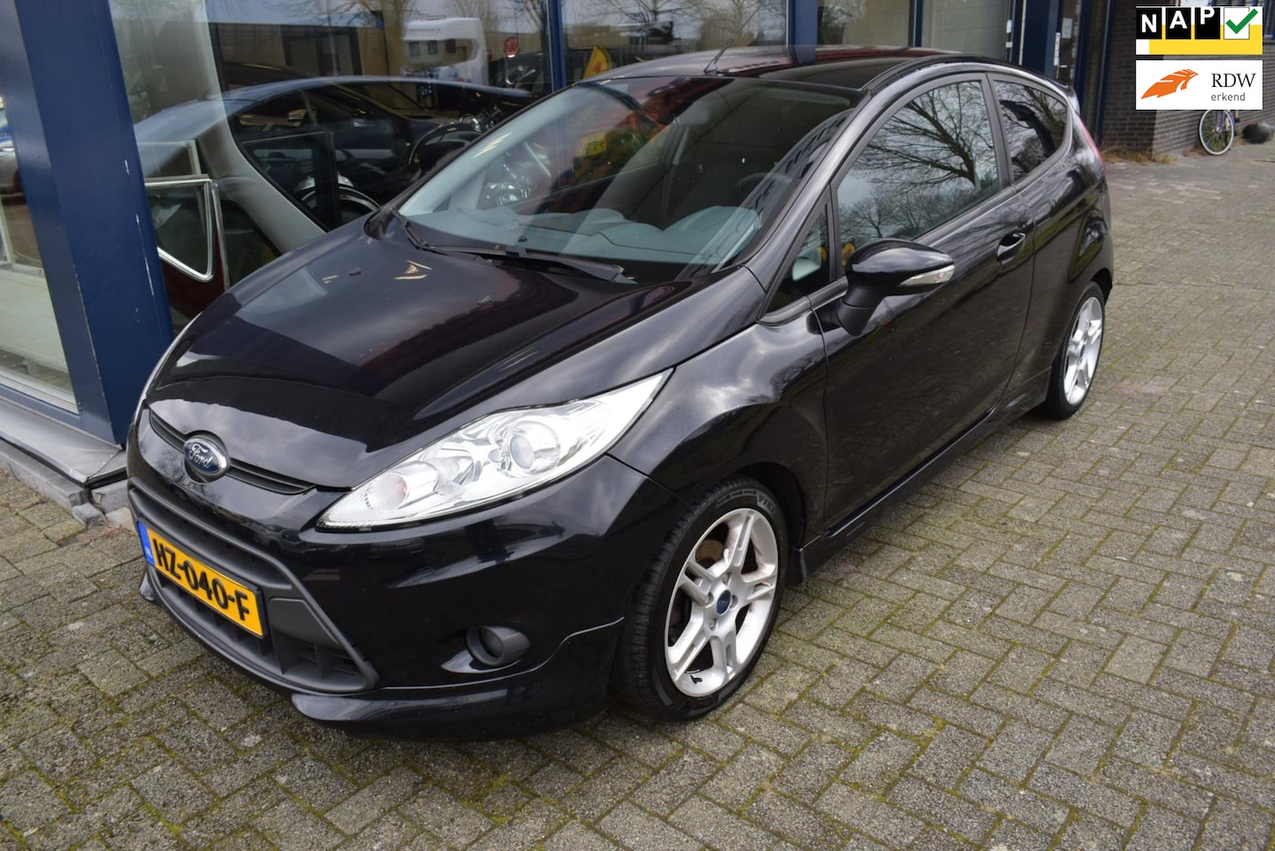 Ford Fiesta - 1.4 Ghia 1.4 Ghia - AutoWereld.nl