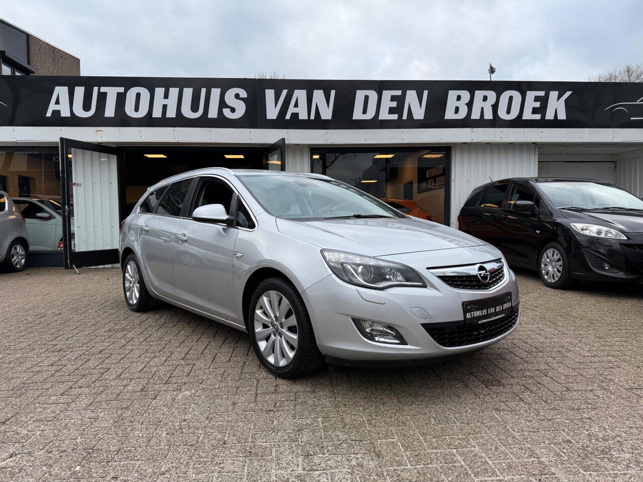 Opel Astra Sports Tourer - 1.4 Turbo Sport 140Pk Xenon Navi Cruise Climate Ctr Stoelver Lmv Elek Pakket Nw Apk - AutoWereld.nl