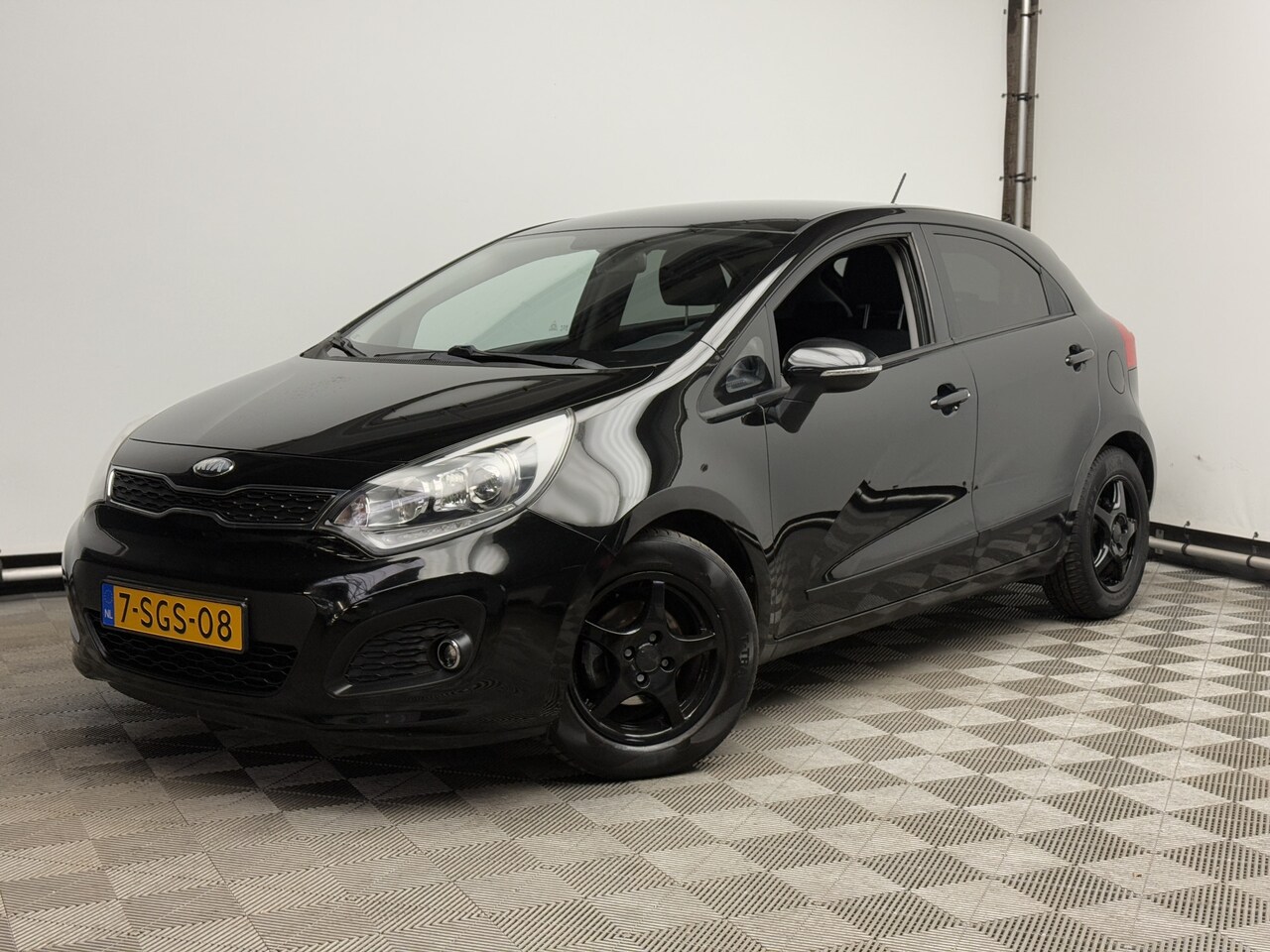 Kia Rio - 1.2 CVVT Plus Pack 5-drs Navi Airco LM15" NL Auto - AutoWereld.nl