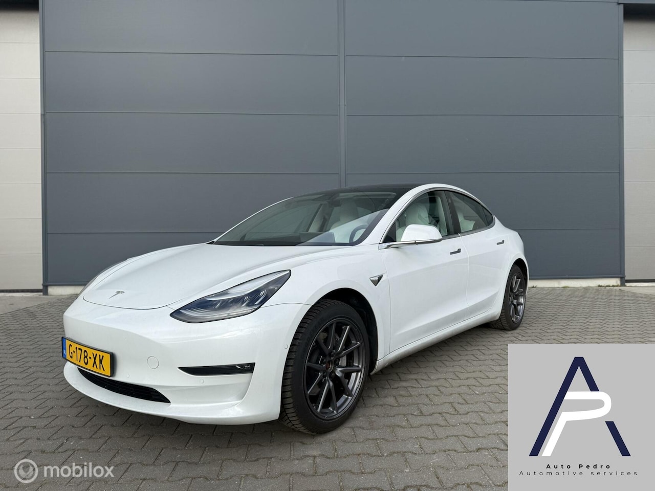 Tesla Model 3 - Long Range RWD Long Range AWD 75 kWh Wit Leder AUTOPILOT BTW Pearl White - AutoWereld.nl